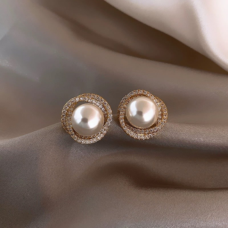 Guliya spiral pearl earrings for women's niche high-end earrings 2024 new popular pure silver needle light luxury earrings